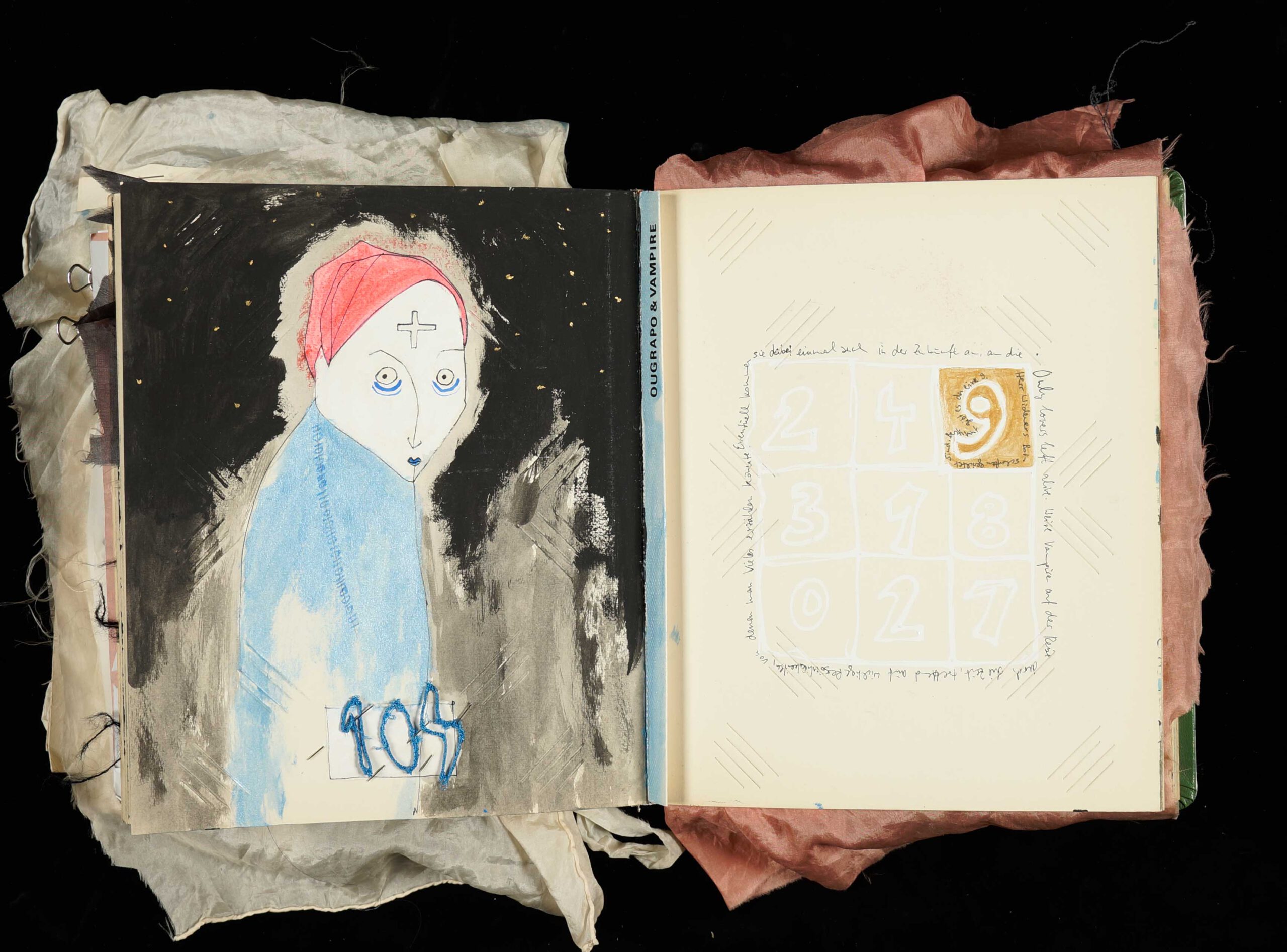 Artist Book with hand-drawn illustration of a friendly vampire with red hair and number 104