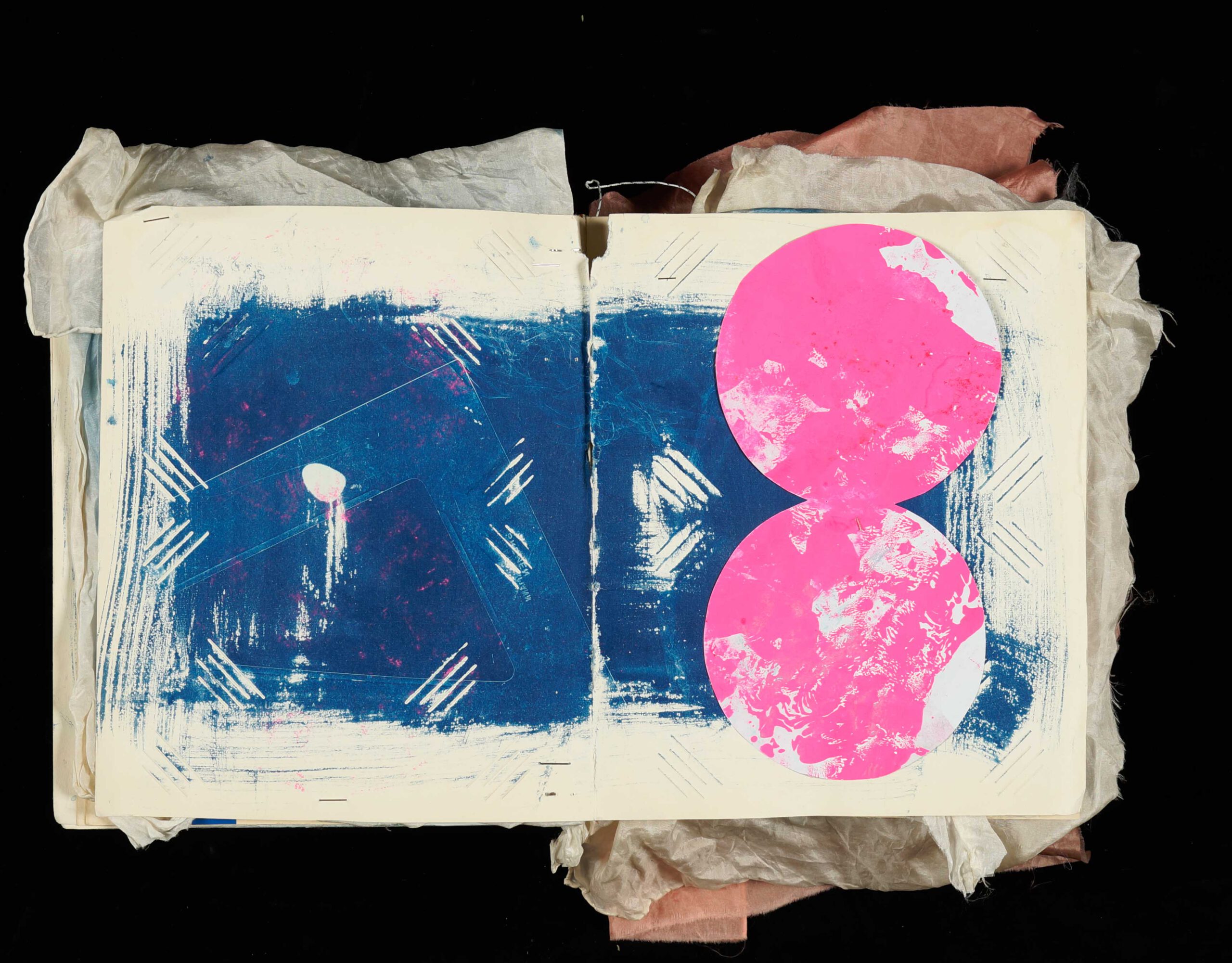 Cyanotype of a triangle in an artist book
