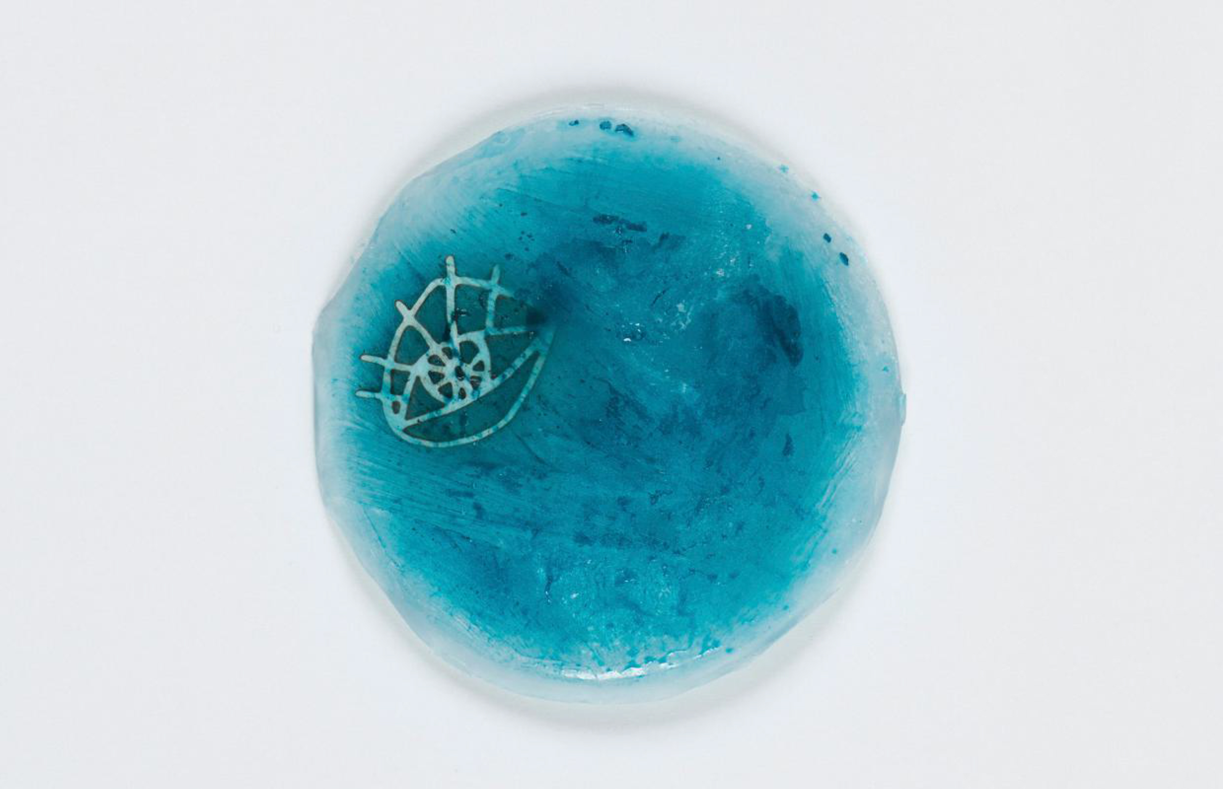 Circular blue ice planet with frozen eye sketch